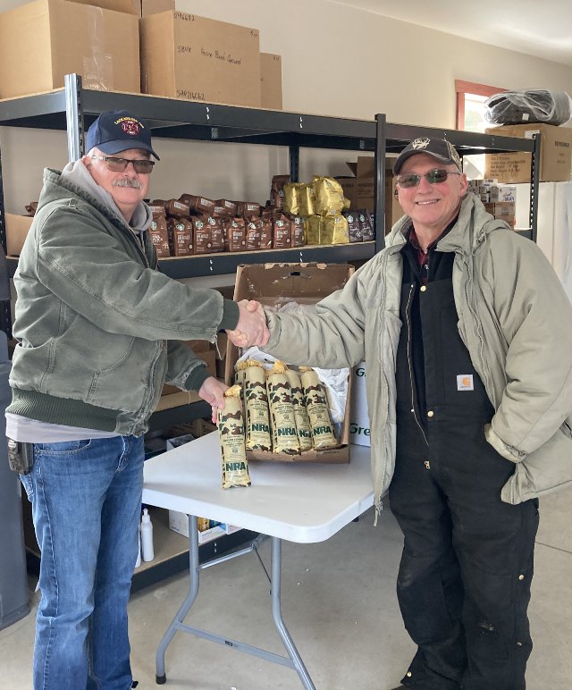 Ron Tussel, Pike County Coordinator for Hunters Sharing the Harvest,
right, delivers venison to Lackawaxen Township’s Care Cabin coordinator Jeff Shook.